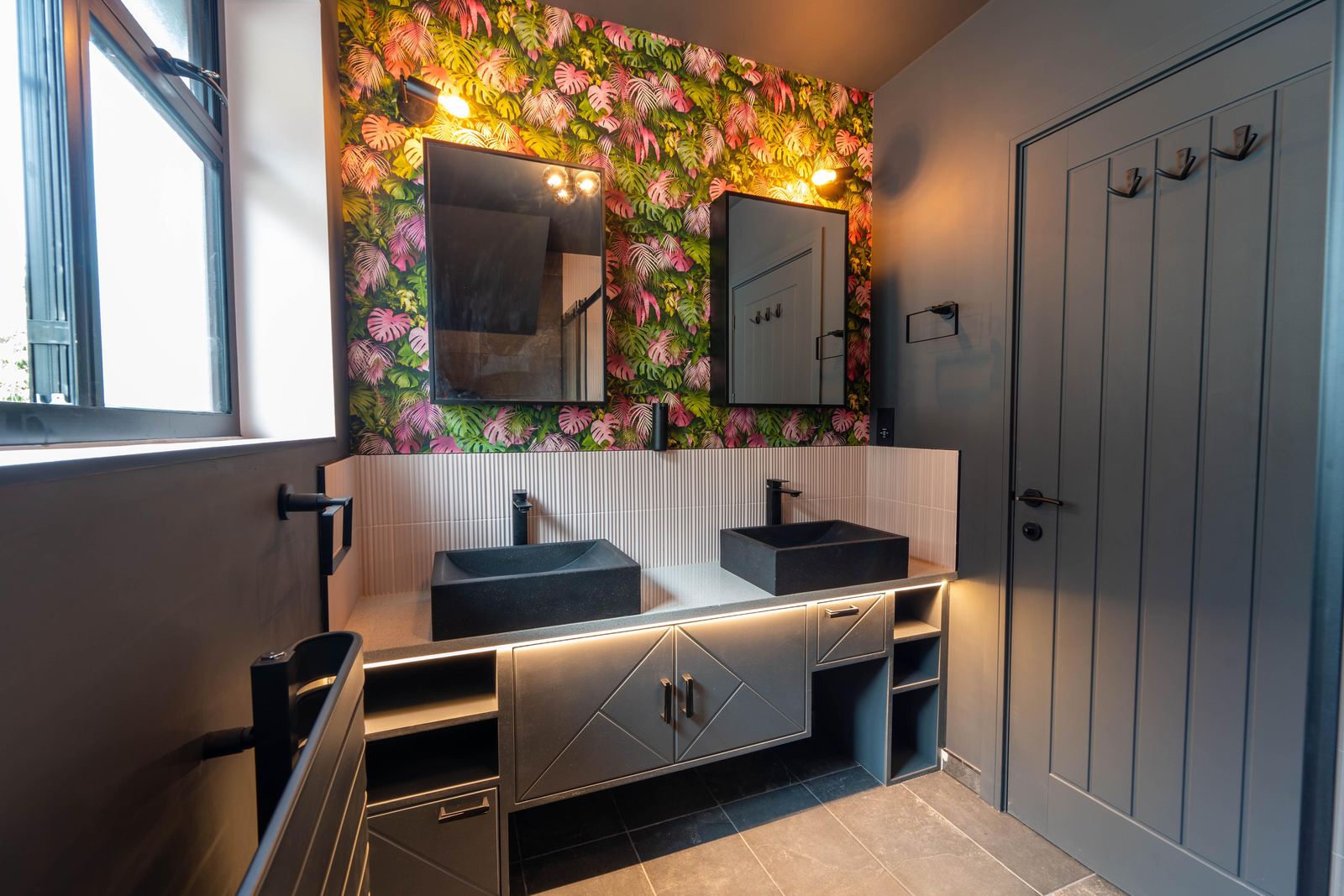 Bathroom renovation with twin basins, bespoke vanity and botanical feature wall
